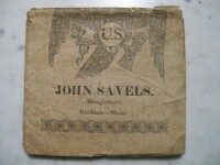 Rear cover with dust jacket made with a wrapper from a ream of rag paper.